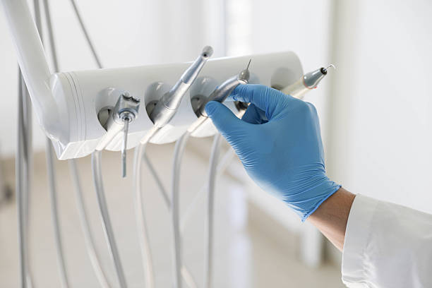 Professional Tooth Extraction technician working in Nokesville, VA